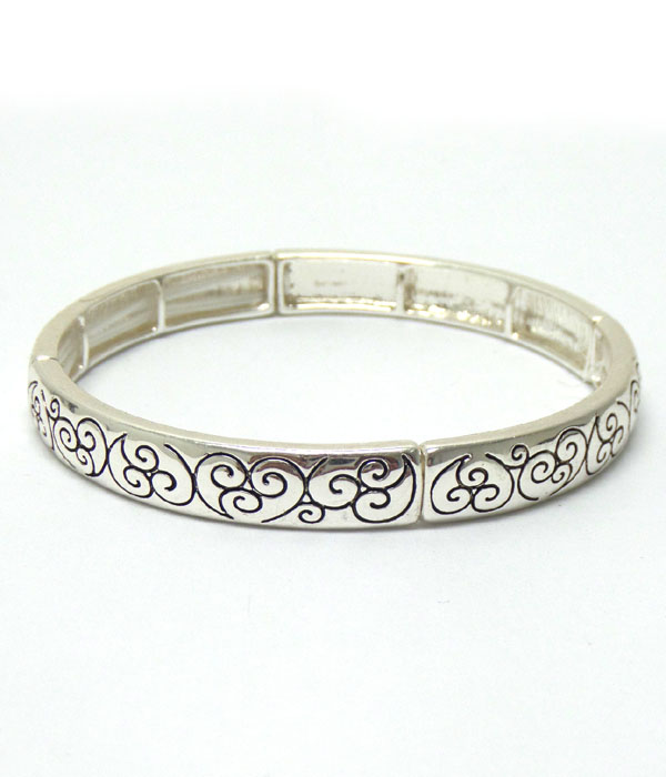 Textured metal with design bracelet 