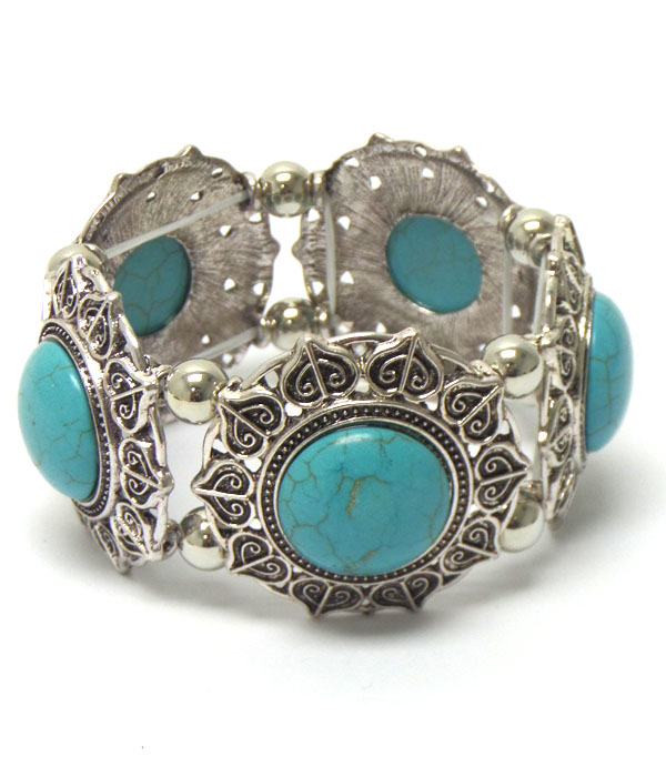 Turquoise stone textured metal border bracelet