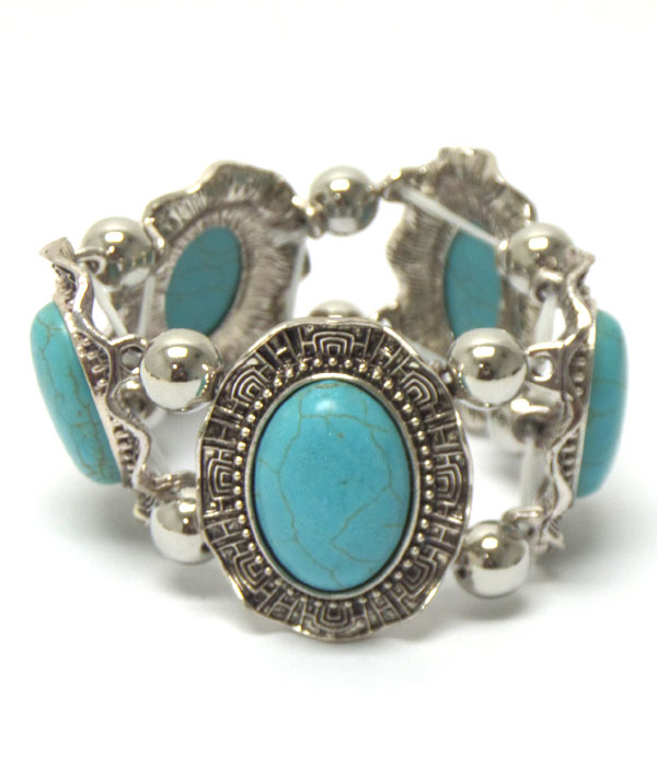 Turquoise stone textured metal border bracelet