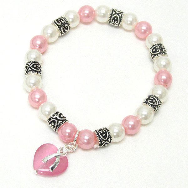 Pink ribbon and heart charm and cats eye stretch bracelet
