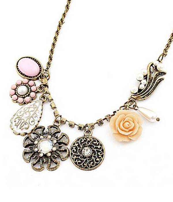 Metal filigree and crystal flower necklace