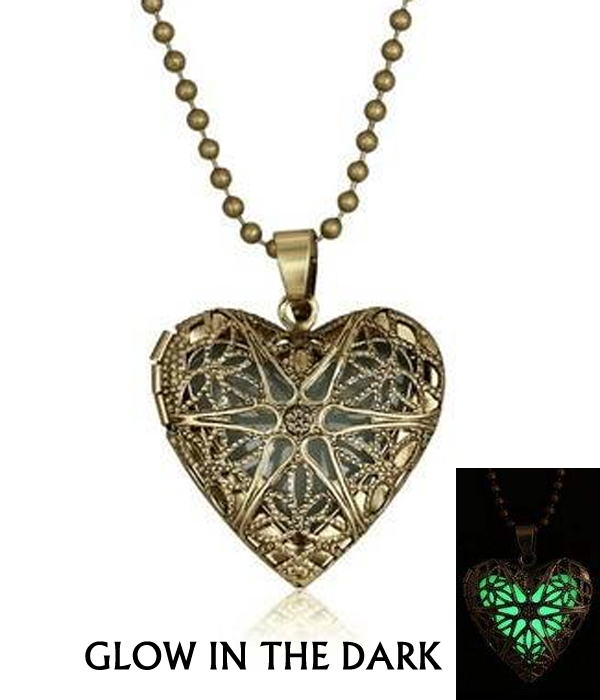 Metal filigree puffy heart glow in the dark necklace