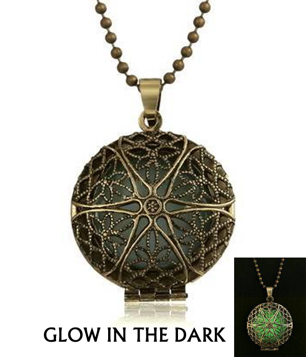 Metal filigree puffy disk glow in the dark necklace