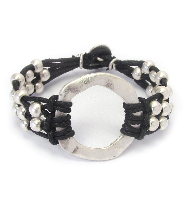 HAMMERED METAL HOOP AND WAX CORD TOGGLE BRACELET