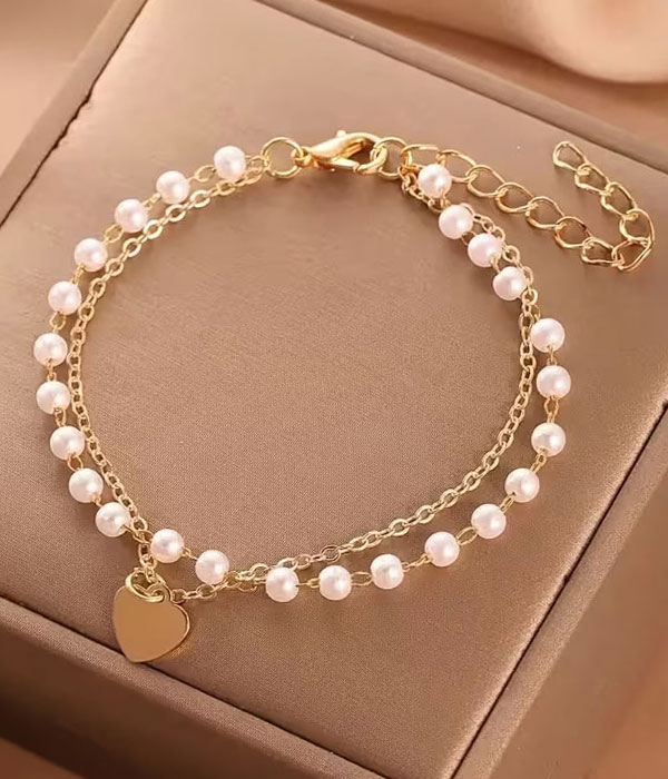 Heart pendant pearl and chain bracelet