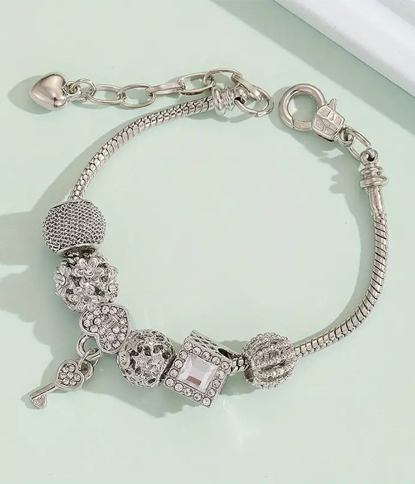 Euro style multi ring bead and key charm bracelet