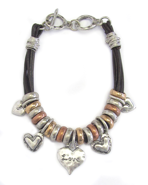 Hammered multi heart charm and cord toggle bracelet