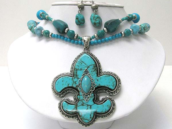 Turquoise stone fleur de lis pendant necklace earring set
