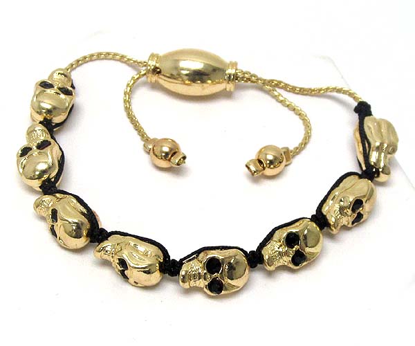 Crystal eyed multi metal skull braided cord bracelet