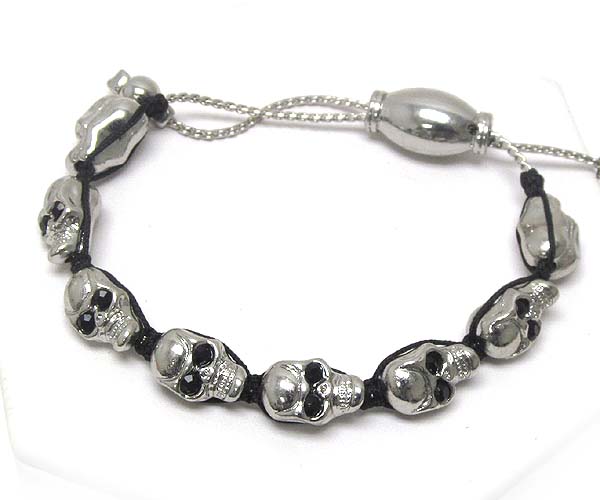 Crystal eyed multi metal skull braided cord bracelet
