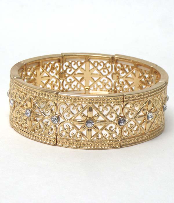 Textured metal designs with stone bracelet