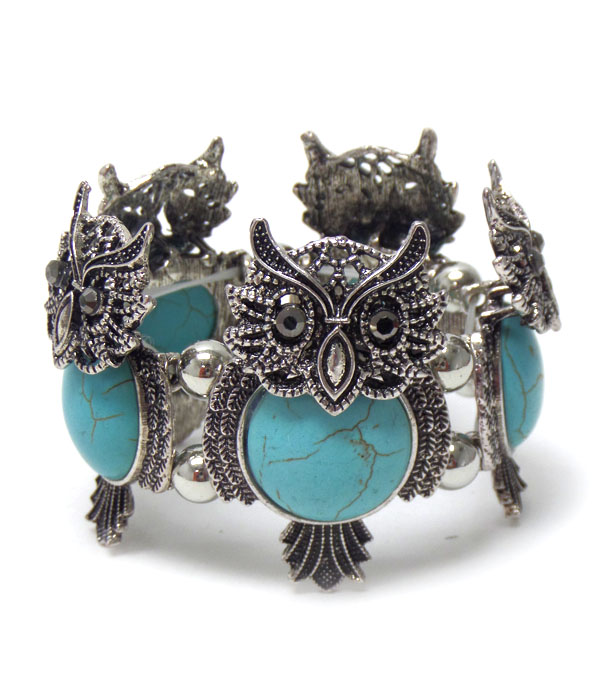 Metal owl with turquoise stone bracelet