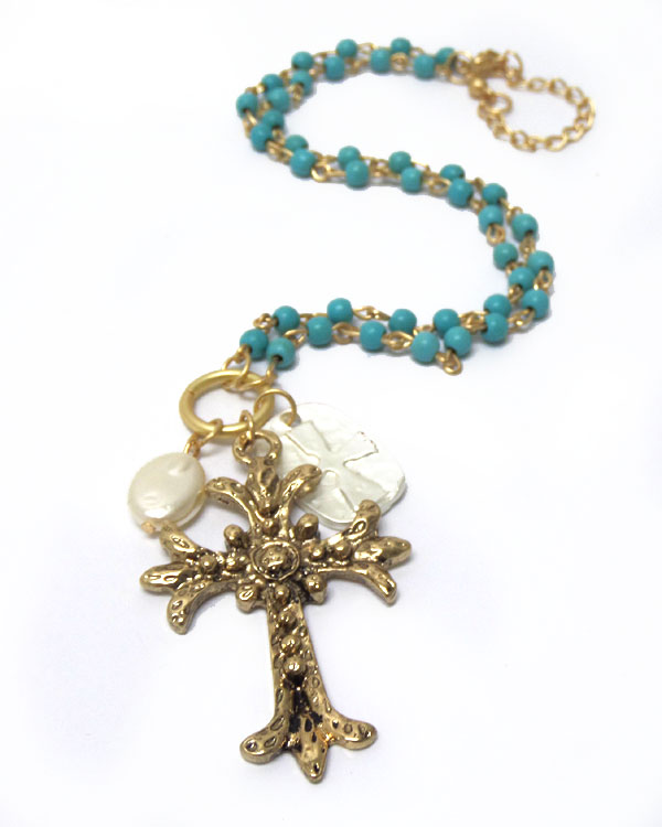 Textured metal cross with small turquoise stones necklace 