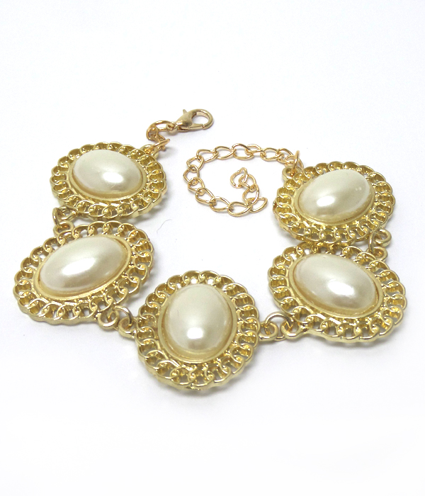 Oval shape stone with border bracelet 