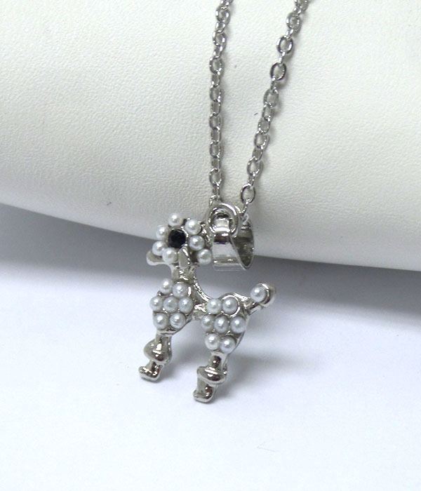 Dog with small pearls necklaec