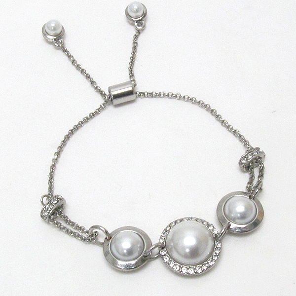 Crystal and triple pearl bracelet