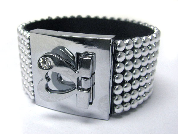 Metal buckle and metal stud leather wrist band