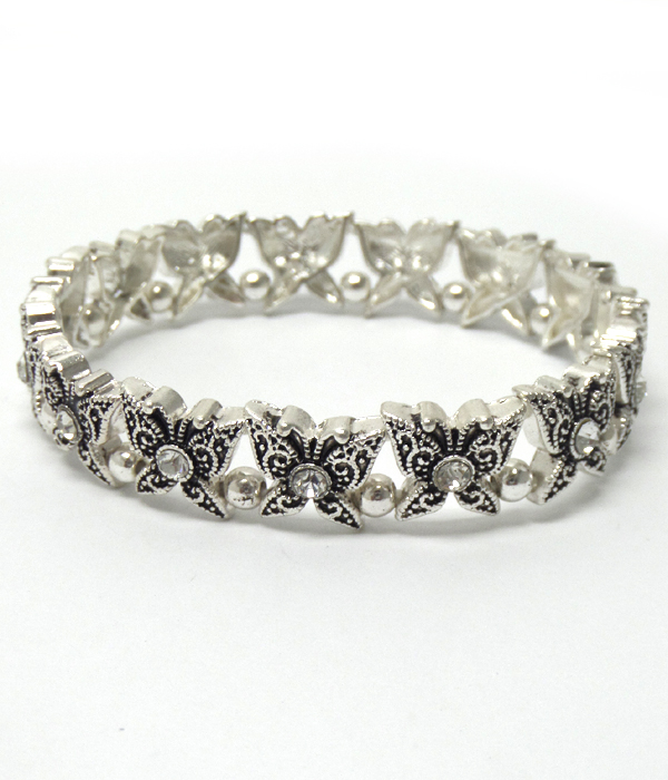 Textured metal butterfly with crystal bracelet