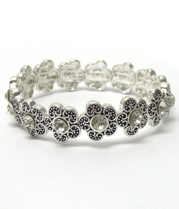 Textured metal flower with crystal bracelet