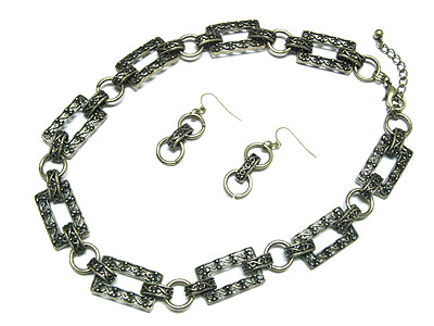 Heavy filigree metal chain link necklace and earring set