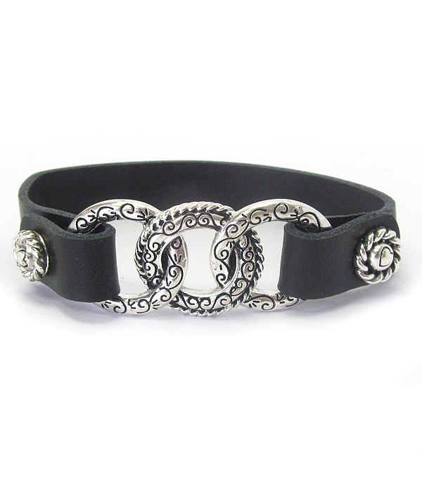 Designer textured triple ring and snap on leather bracelet