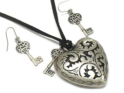 Metal filigree puffy heart and key charm suede cord necklace and earring set