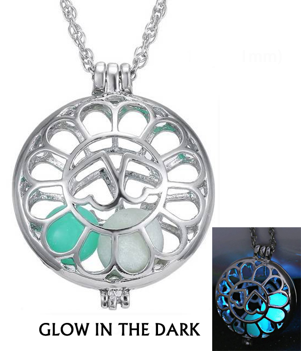 Metal filigree heart disk glow in the dark necklace