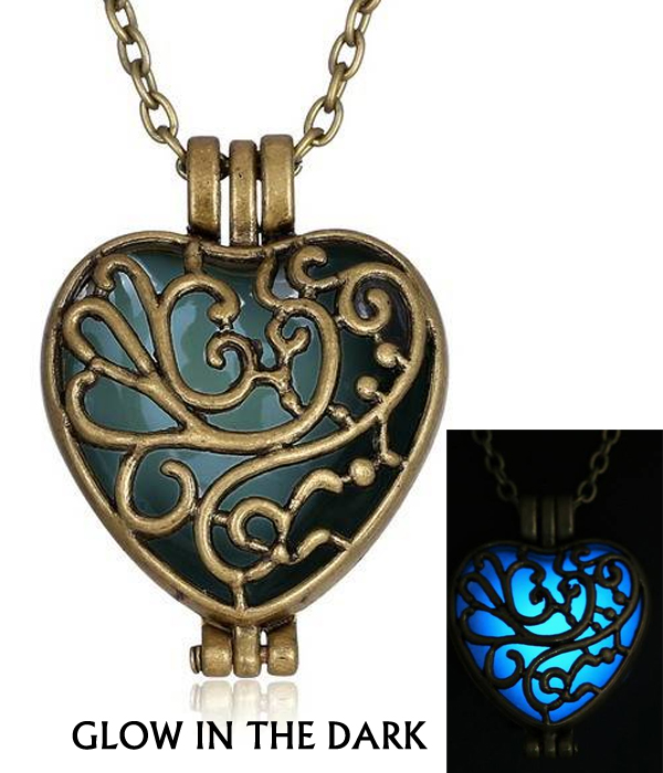 Metal filigree puffy heart glow in the dark necklace