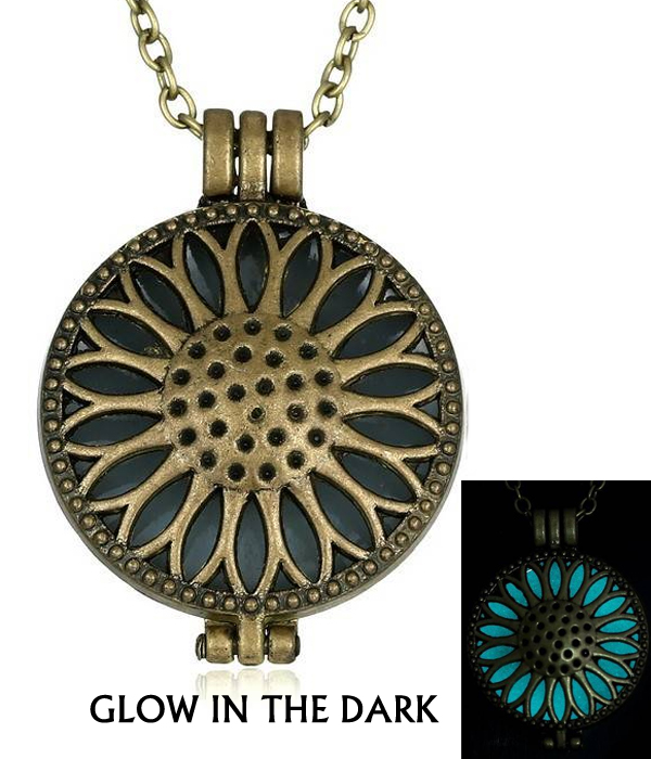 Metal filigree puffy flower disk glow in the dark necklace