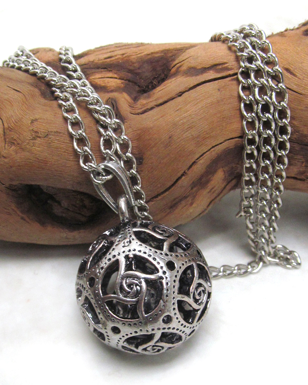 Tibetan silver metal textured bell necklace
