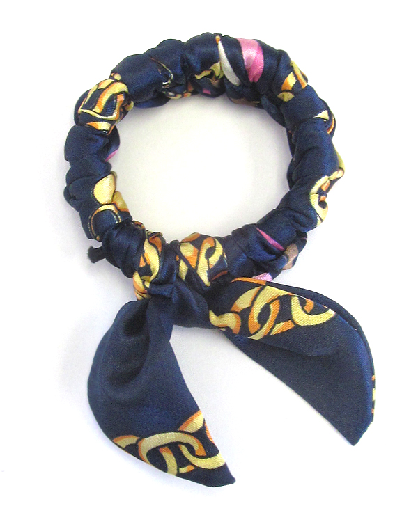 Fabric tie stretch bracelet or pony tail in one