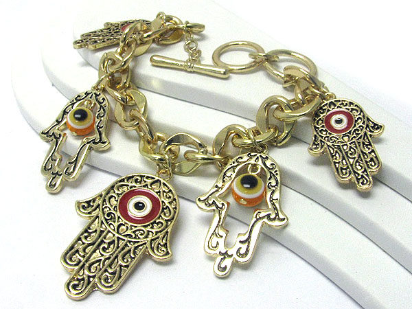 Evil eye and hamsa charm dangle toggle bracelet