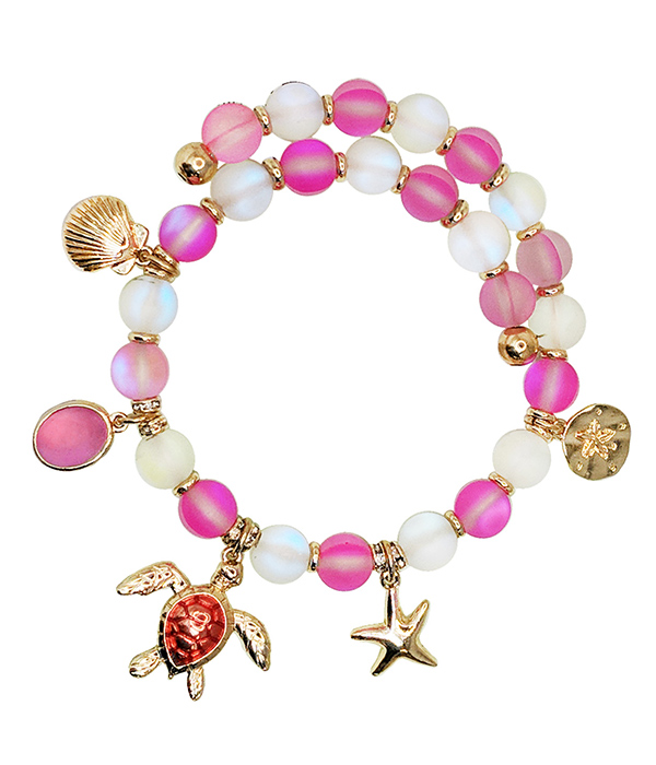 SEALIFE THEME MULTI CHARM AND BALL BEAD COIL BRACELET - TURTLE STARFISH