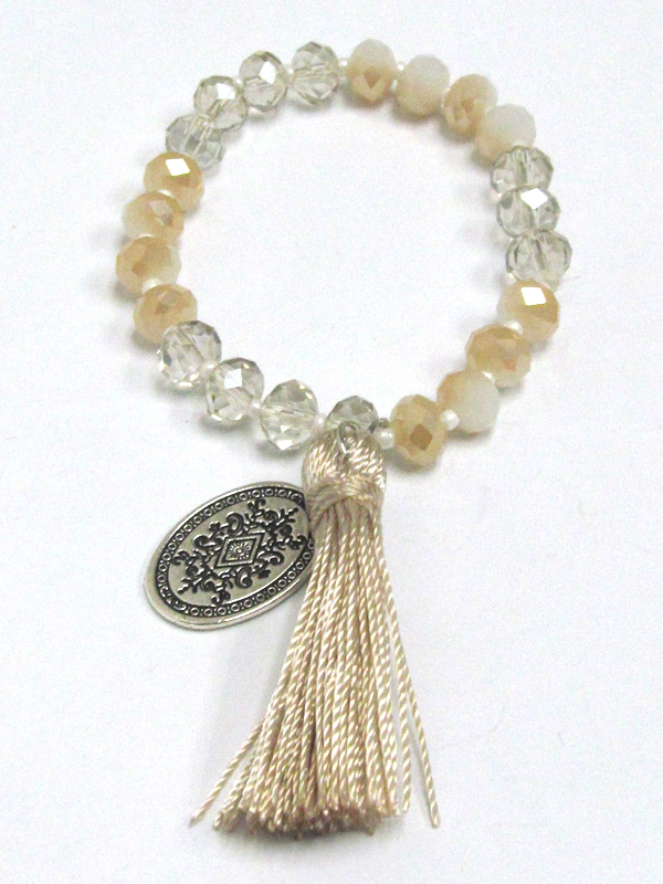 Multi glass beads with pom pom tassel charm bracelet