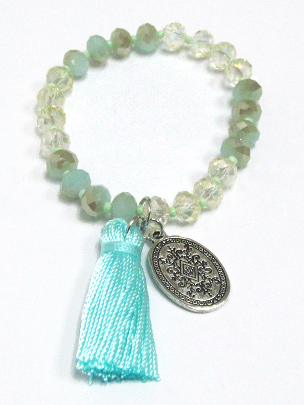 Multi glass beads with pom pom tassel charm bracelet