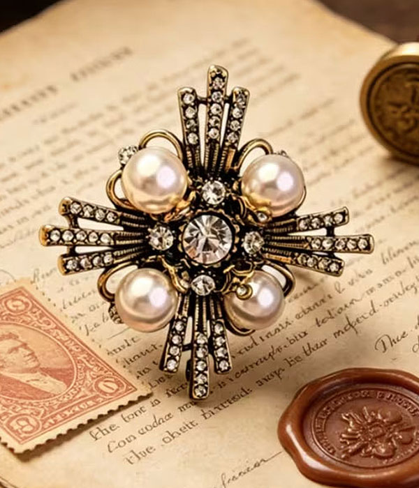 Vintage pearl rhinestone cross brooch