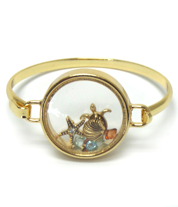 Origami style sea life charms inside bangle barcelet