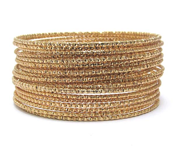 MULTI TEXTURED METAL BRACELET