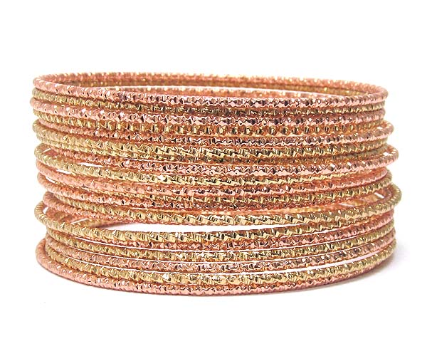 MULTI TEXTURED METAL BRACELET