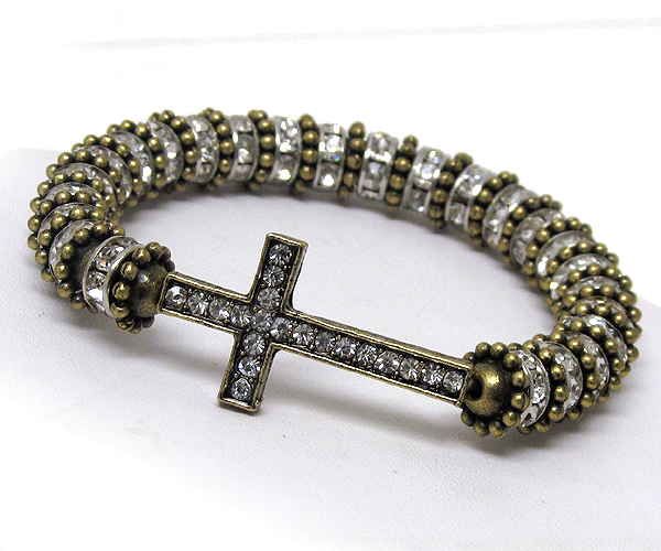 Multi crystal rondell with textured ring and crystal cross in between stretch barcelet