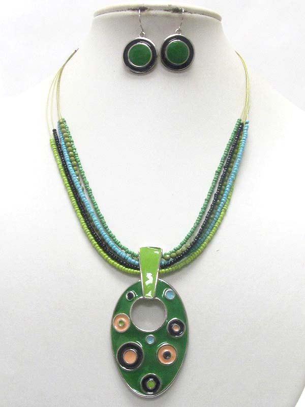 Epoxy metal oval pendant and multi seed bead strands necklace and earring set